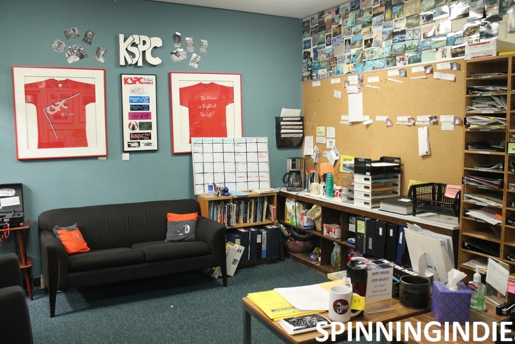 KSPC Lobby with couch, Leo Blais sign. Photo: J. Waits