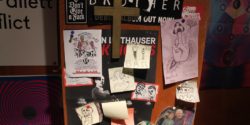 Flyers and artwork on the wall at WXTJ, including some referencing old call sign (WTJX). Photo: J. Waits