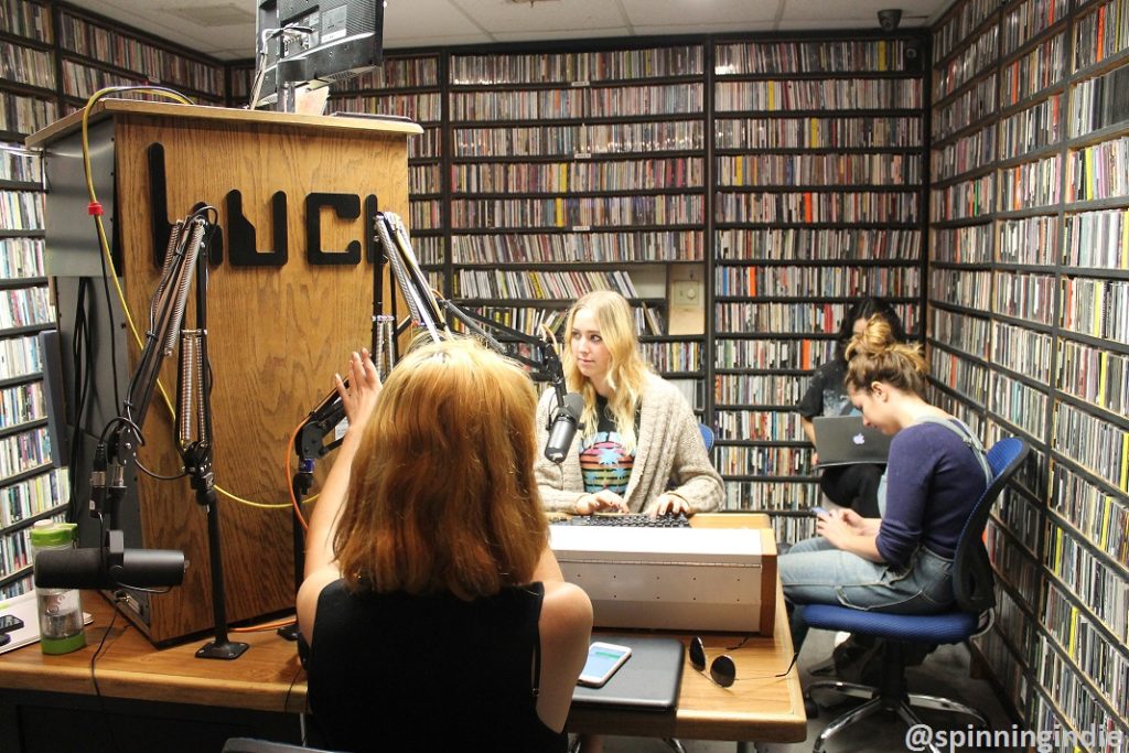 DJs in the on-air booth at KUCI. Photo: J. Waits