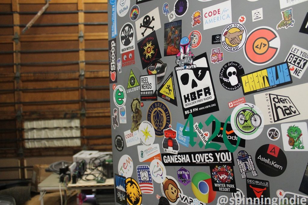Sticker-covered door at DenHac. Photo: J. Waits