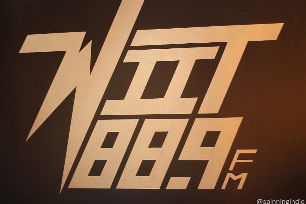 WIIT logo on wall of radio station. Photo: J. Waits