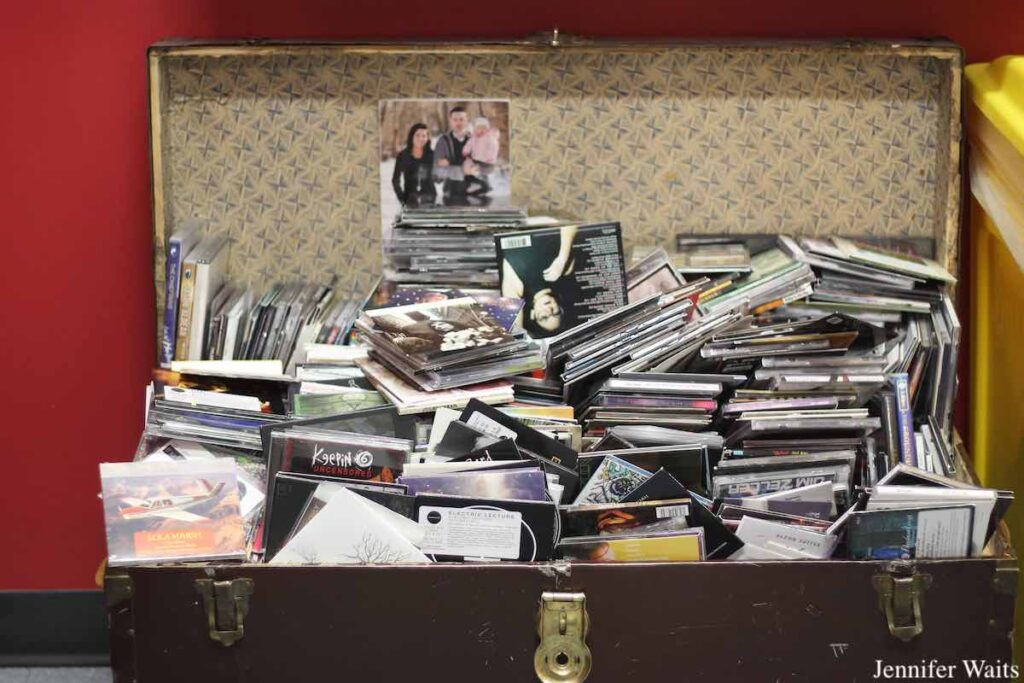 Photo of trunk overflowing with CDs at radio station CJSR-FM. Photo: J. Waits